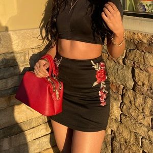 Black mini skirt with flowers